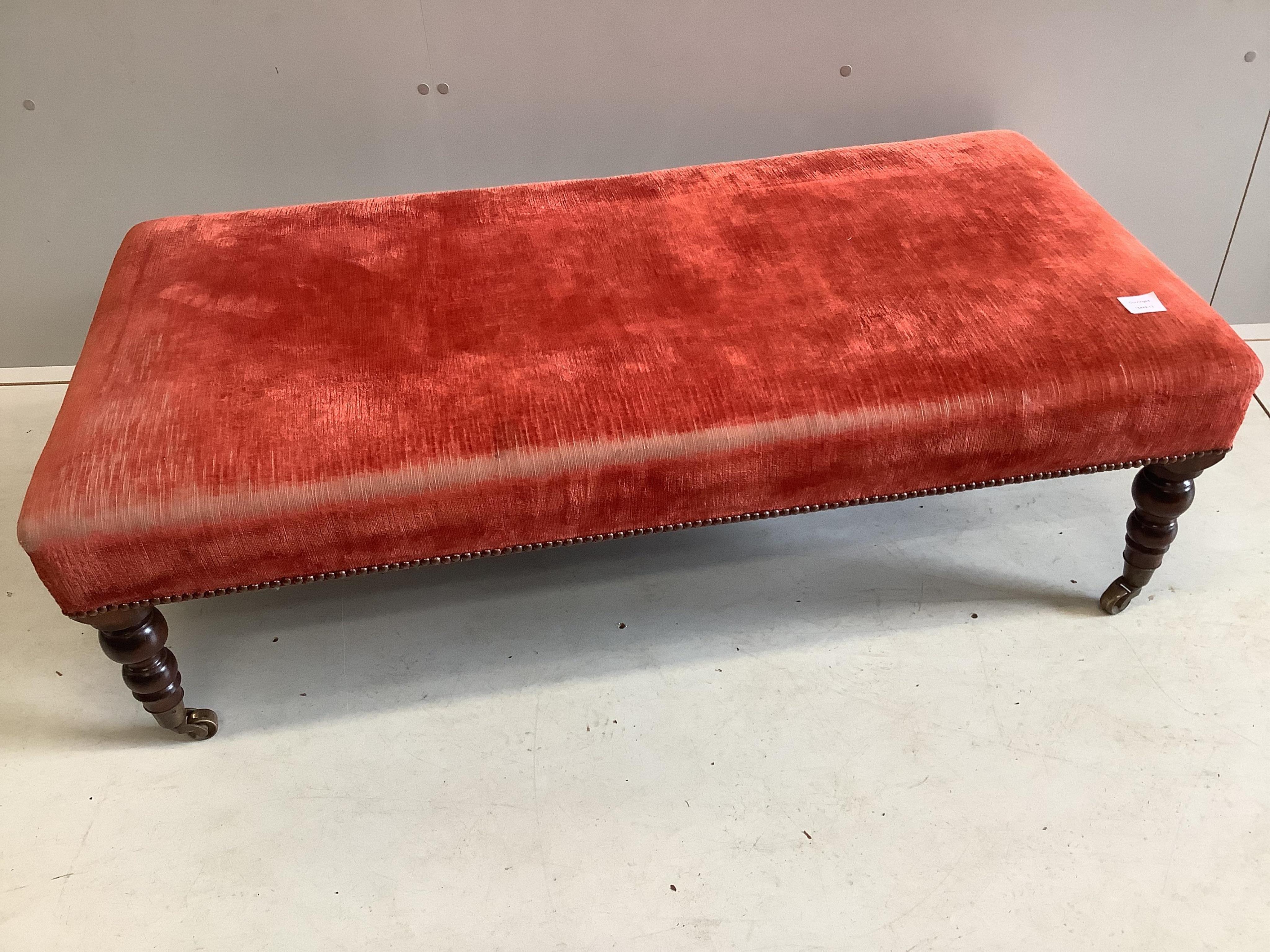 A reproduction Victorian style rectangular footstool, width 124cm, depth 62cm, height 37cm. Condition - poor to fair